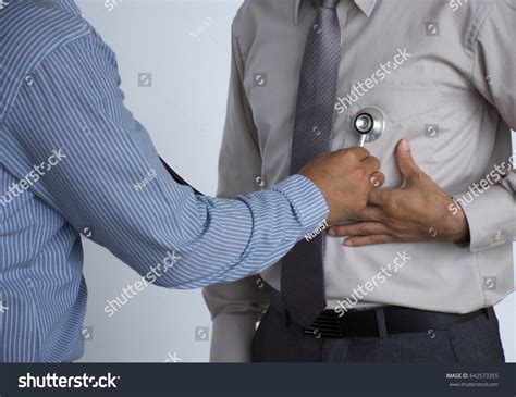 Man Having Chest Pain Doctor Stethoscope Stock Photo 642573355