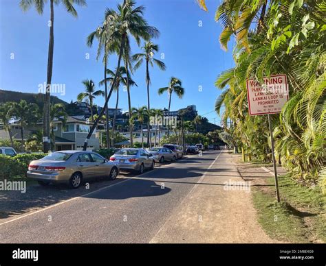 Cars Of Lanikai Beach Visitors Parked Bumper To Bumper Along Mokulua