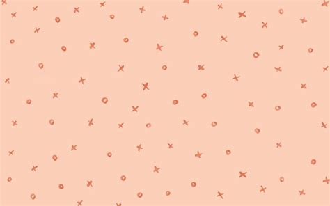 an orange and pink background with small stars