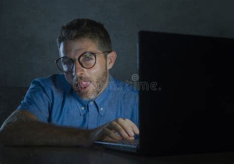 Addict Man At Computer Laptop Watching Internet Addiction Concept Stock