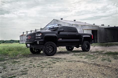 Off Road Enthusiast Dream Black Lifted Silverado With Custom Parts