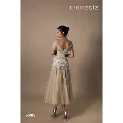 Look Fresh And Pretty In This Dress By Tarik Ediz Charms In A