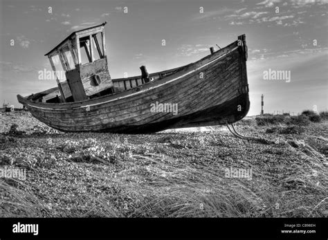 An Old Abandoned Fishing Boat On The Beach At Dungeness Kent Uk The