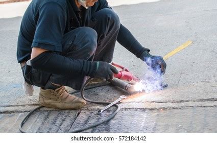 Man Welding Helmet Welding Steel Stock Photo 572184142 Shutterstock