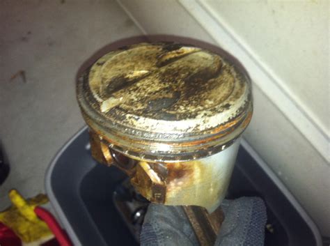 What Causes Carbon Build Up On Piston Top