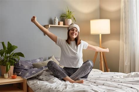 Premium Photo Indoor Shot Of Smiling Satisfied Delighted Woman