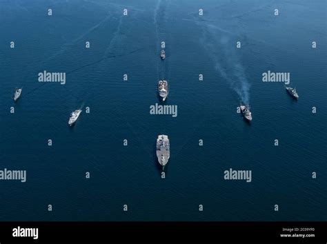 Navy Ships From Nato Member Nations In Sail In Formation During