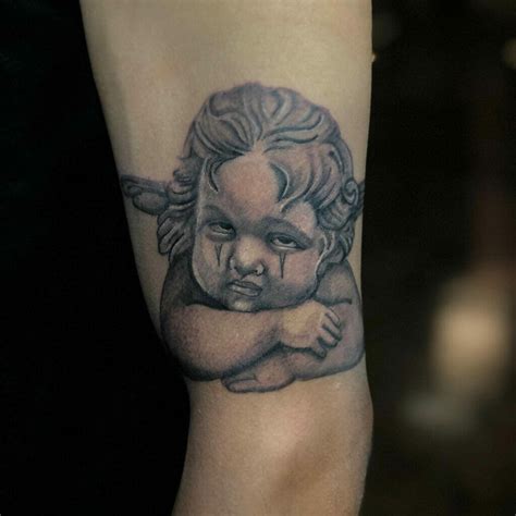 11 Little Angel Tattoo Ideas That Will Blow Your Mind