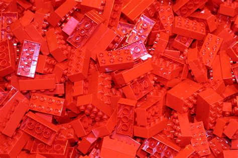 a pile of red lego bricks sitting on top of each other