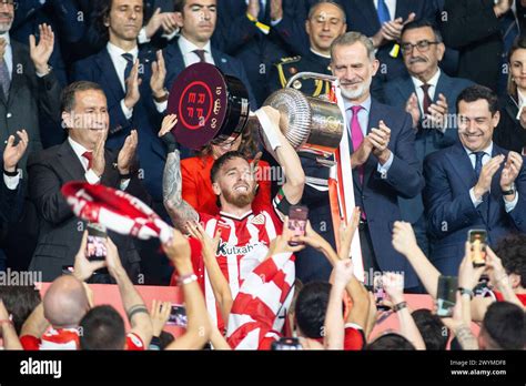 Iker Muniain Of Athletic Club Celebrates With The Trophy During The