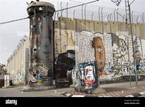 Jerusalem, Israel - 12/15/2019: graffiti on the wall between border of ...