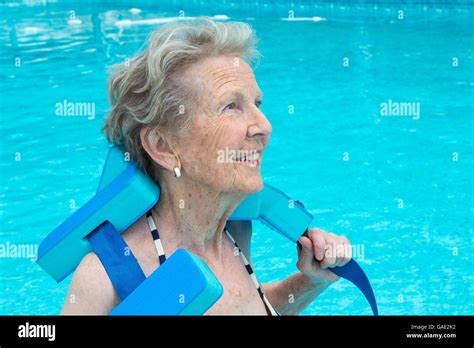 Older Woman Swimming In Pool Hi Res Stock Photography And Images Alamy