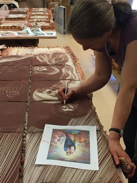 Cynthia Carving The Faces For The New Public Mural By Natalie Blake