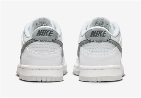 Kids Nike Dunk Low Comes With Reflective Swooshes Sneakers Cartel