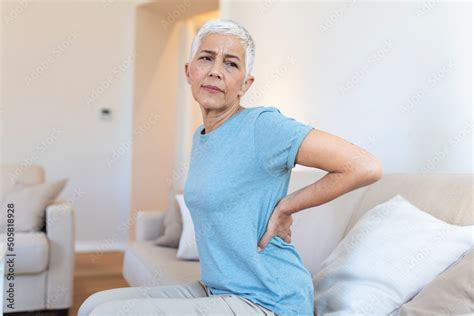 Matur Woman Suffering From Lower Back Pain Mature Woman Resting With