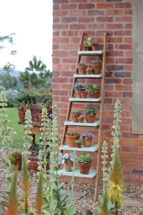 Diy Turn A Ladder Into A Striking Display Unit Diy Ladder Decorations