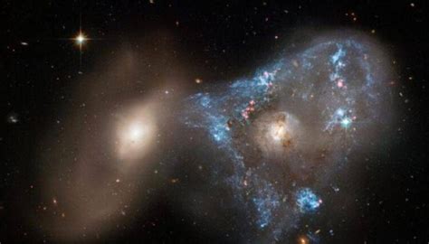 33 billion light-years...the discovery of the second farthest galaxy ...