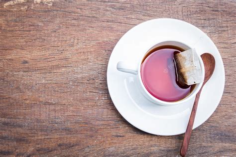 Premium Photo Cup Of Tea On Wooden Background