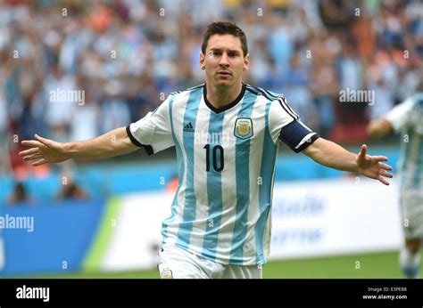 Porto Alegre, Brazil. 25th June, 2014. Argentina's Lionel Messi celebrates for scoring a goal ...