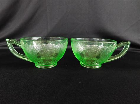 Green Vaseline Glass Set Of Two Cups 2 Embossed With Flowers Vaseline Glass Glass Set Glass