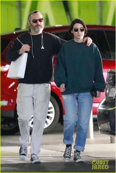 Joaquin Phoenix Stays Close To Girlfriend Rooney Mara While Shopping