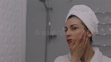 Woman With White Towel On Her Head Massaging Her Face After Shower Stock Video Video Of