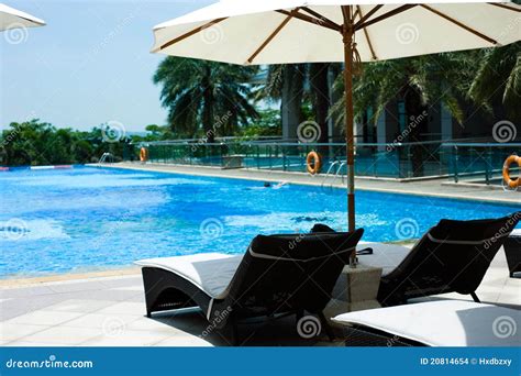 Pool and umbrellas stock photo. Image of clear, plants - 20814654