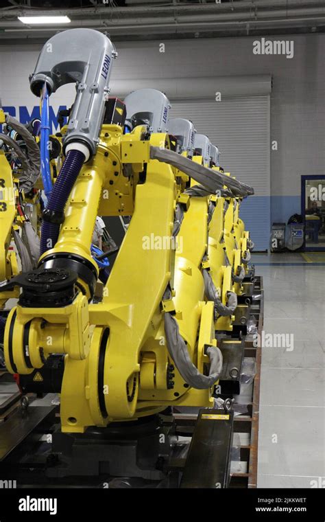 A Closeup Of Yellow Ge Fanuc Robots Stock Photo Alamy