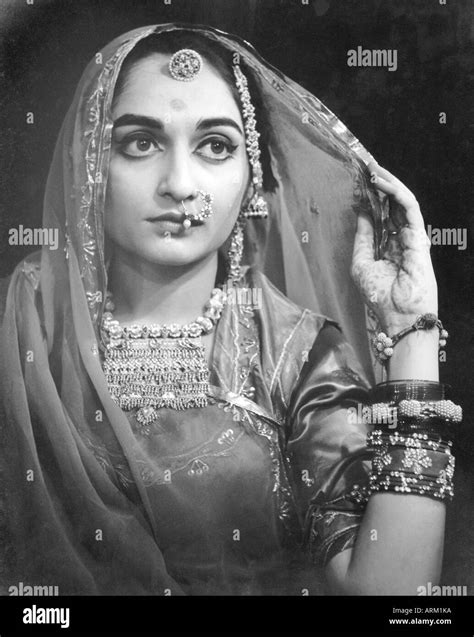 Old Vintage 1940s Portrait Of Indian Bride Wearing Wedding Dress And