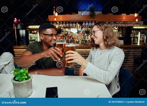 Happy Young Multiracial Group Of Friends In Casual Clothing Smiling