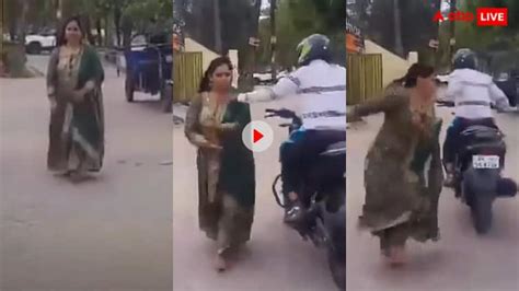 Bike Rider Snatched Chain From The Neck Of A Woman Making Reel On Road Watch Viral Video Viral