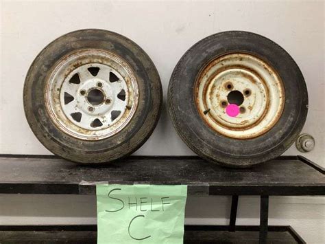 2- SMALL TRAILER TIRES - Currie Auction Service