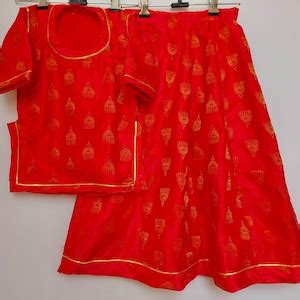 Traditional Indian Rajasthani Rajputi Poshak In Carrot Coloured Satin