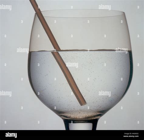 Refraction Of A Straw In A Glass Of Water Stock Photo Royalty Free