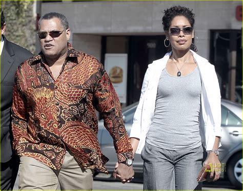 Full Sized Photo of laurence fishburne gina torres holding hands 02 ...