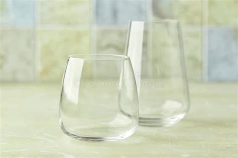 Two Empty Glasses For Water Or Cocktails On Light Table Glasses Cup For Drinks Stock Image