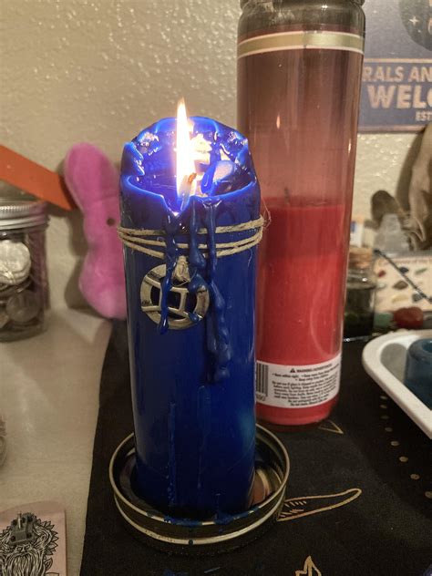 The flame in my blue candle started getting super big again! : r/Witch