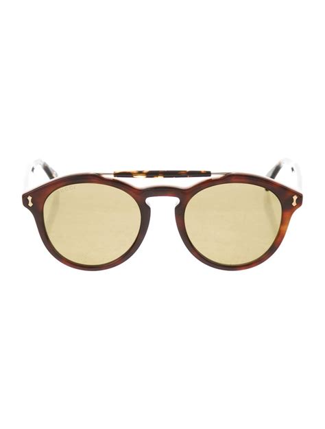 Brown Tortoiseshell Resin Gucci Round Sunglasses With Tinted Lenses Top Bar And Logo Accents At