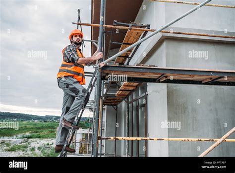 Climbing Scaffolding High Resolution Stock Photography and Images - Alamy