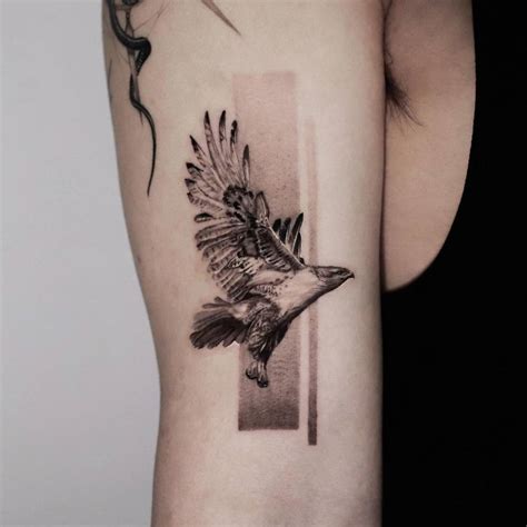 Micro Realistic Style Falcon Tattoo Located On The