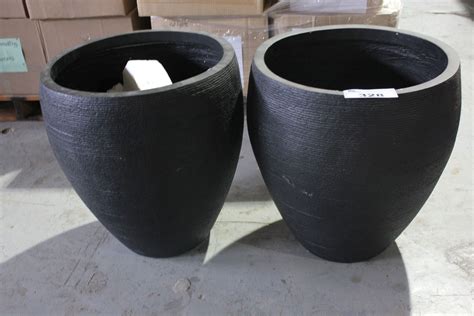 PAIR OF LARGE BLACK PLANTERS