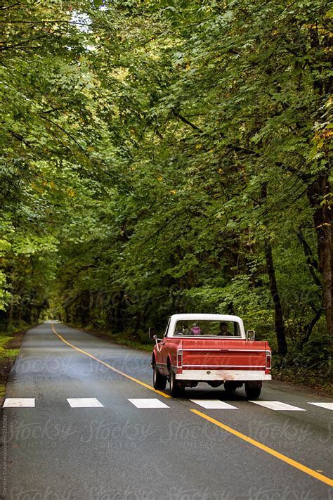 Truck Driving Down Road