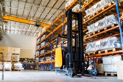 Modern Warehouse With Forklifts Stock Photo Adobe Stock