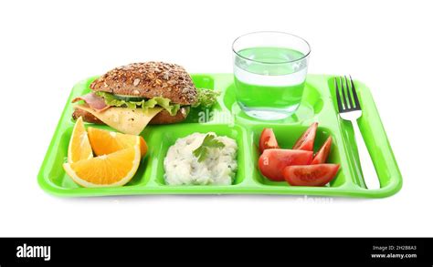 Serving tray with healthy food on white background. School lunch Stock ...