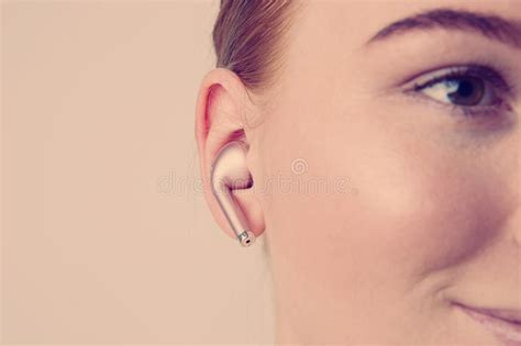 Happy Redhead Female Model With Light Nude Make Up Posing Over White Background Stock Photo