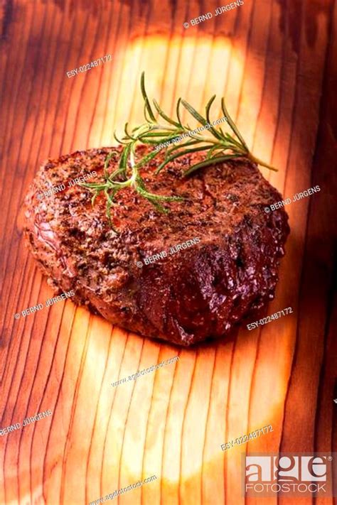 Steak Vom Grill Mit Rosmarin Stock Photo Picture And Low Budget