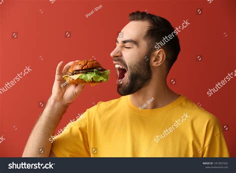 6,252 Guy eating burger Images, Stock Photos & Vectors | Shutterstock