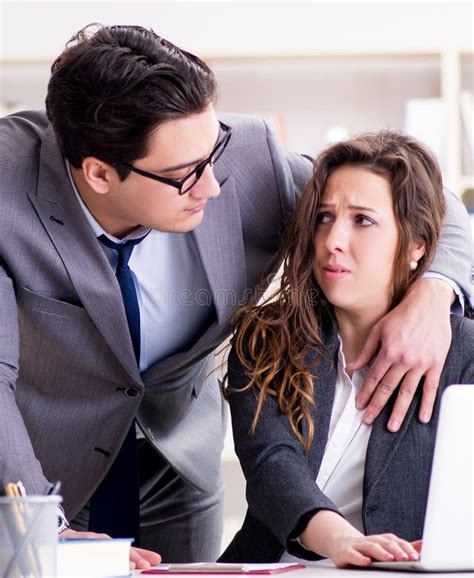 Sexual Harassment Concept With Man And Woman In Office Stock Image