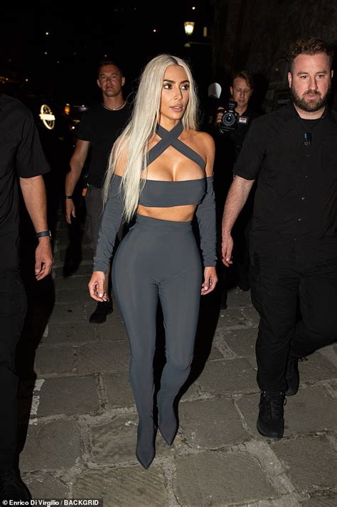 Kim Kardashian Flaunts Her Curves In A Very Busty Grey Crop Top At