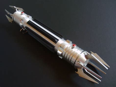 Elegance Redefined • The Double Bladed Lightsaber A Single Hilt With